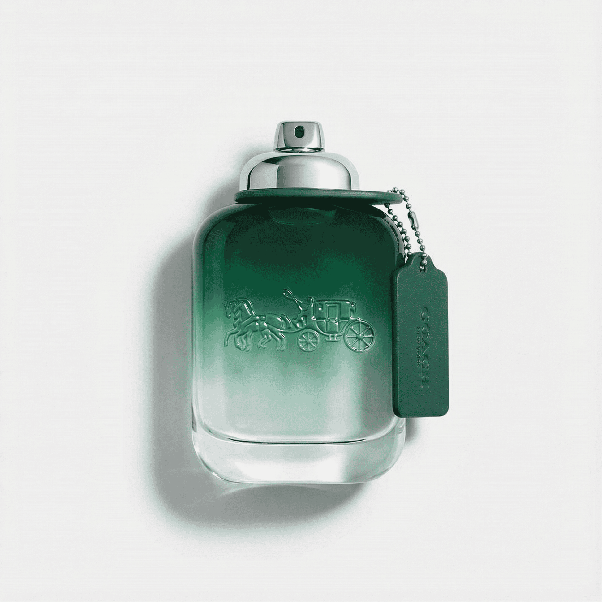 Luxury green perfume bottle with horse and carriage embossed design, elegant and stylish.