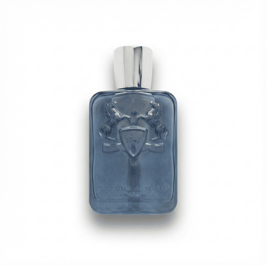 Luxurious men's perfume bottle with embossed heraldic design on a sleek blue glass surface.