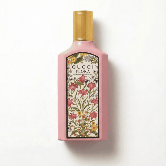 Soft pink Gucci Flora decorative bottle with floral design, luxurious scent for women.
